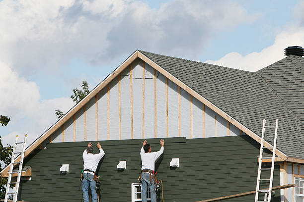Professional Siding Repair technician working in Reinholds, PA